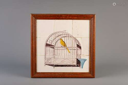 A Dutch Delft polychrome tile mural with a bird cage,