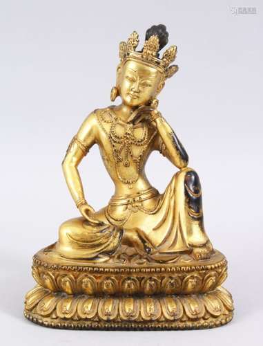 A 19TH / 20TH CENTURY SINO TIBETAN GILT BRONZE BUDDHA FIGURE, The Buddha with its head tilt, upon