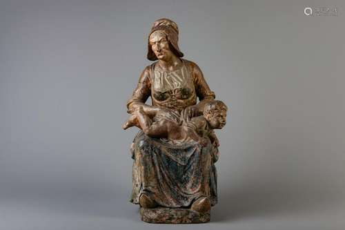 A polychrome decorated terracotta group of mother and