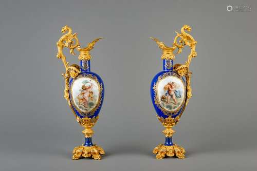 A pair of fine gilt bronze mounted jugs in the Sèvres