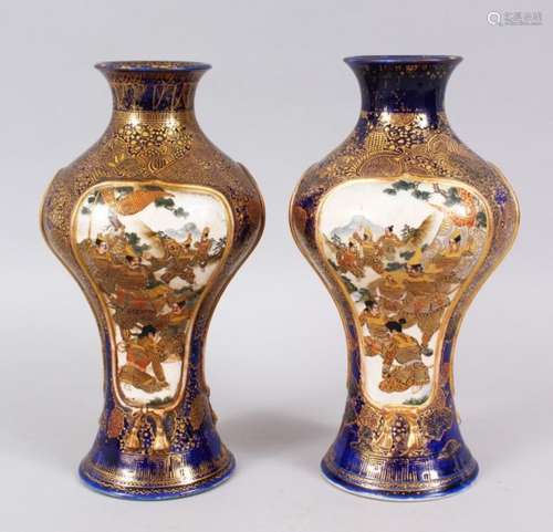 A GOOD PAIR OF JAPANESE MEIJI PERIOD SATSUMA VASES, decorated upon a blue ground with two moulded