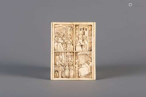 A Gothic Revival carved ivory panel with Christian