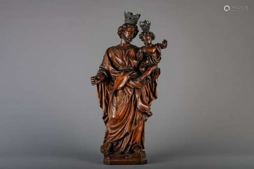 A large carved wood figure of Saint Joseph and Child,