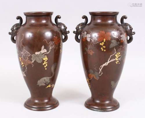 A GOOD PAIR OF JAPANESE BRONZE & MIXED METAL TANUKI VASES, the body of each vase inlaid with mixed