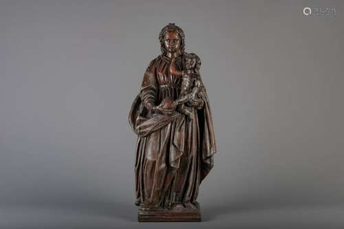 A large carved wood figure of the Virgin and Child with