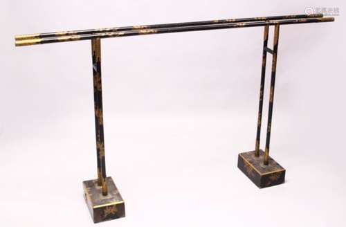 A JAPANESE MEIJI PERIOD LACQUER TWIN RAIL KIMONO RAIL, the rectangular formed bases with double