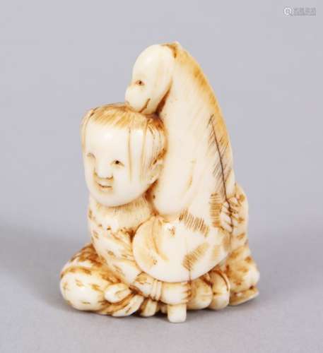 A GOOD JAPANESE MEIJI PERIOD CARVED IVORY NETSUKE OF KARAKO WITH HOBBYHORSE, The boy in a seated