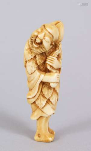 A GOOD JAPANESE LATE EDO PERIOD CARVED IVORY NETSUKE OF TOBOSAKU SENNIN, stood holding his gourd &