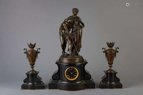 A three-piece black marble clock garniture with on top