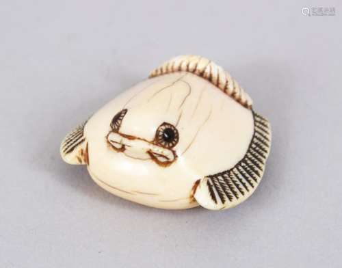 A GOOD JAPANESE EDO PERIOD CARVED IVORY NETSUKE OF A STYLIZED BIRD, eyes inlaid, details stained,