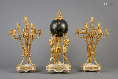 A large and impressive three-piece gilt bronze and