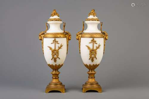 A pair of gilt bronze mounted white marble cassolettes,