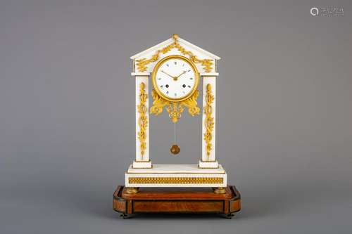 A French white marble and gilt bronze portico clock