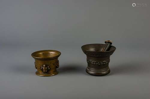 Two bronze mortars and a pestle, the Low Countries or