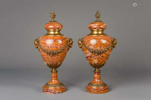 A pair of Neoclassical gilt bronze mounted Breccia