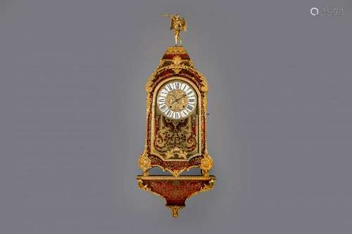 A French gilt bronze mounted red tortoiseshell and