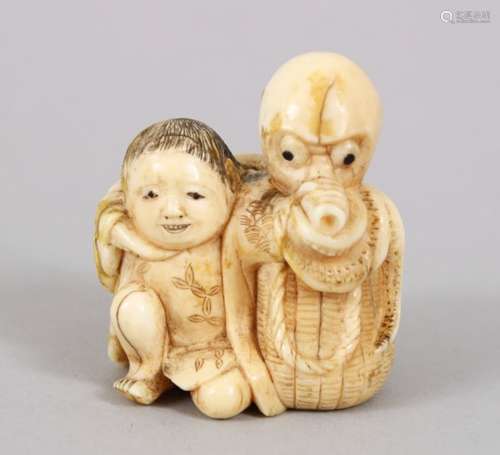 A LARGE JAPANESE MEIJI PERIOD CARVED IVORY NETSUKE OF A KARAKO ACTOR & OCTOPUS, The boy crouched