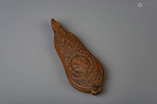 A carved wooden armorial tobacco rasp, France, 18th C.