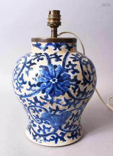 A 19TH CENTURY CHINESE BLUE & WHITE CRACKLE GLAZE PORCELAIN VASE / LAMP, the body decorated on a