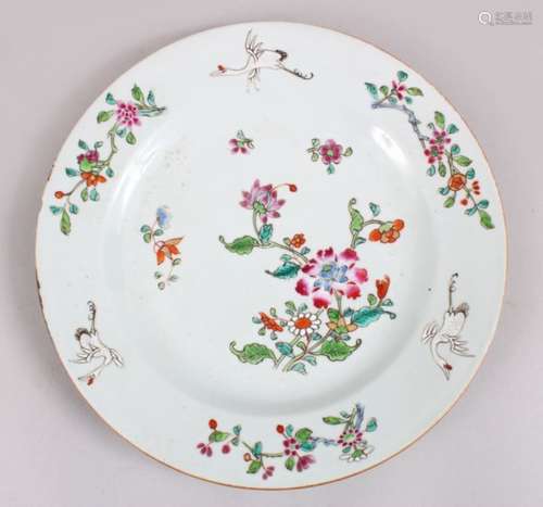 A GOOD 18TH CENTURY CHINESE FAMILLE ROSE PORCELAIN PLATE, decorated with scenes of cranes amongst