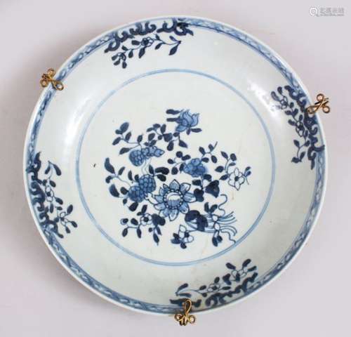 A GOOD 18TH CENTURY CHINESE BLUE & WHITE PORCELAIN PLATE, decorated with floral scenes, mounted with