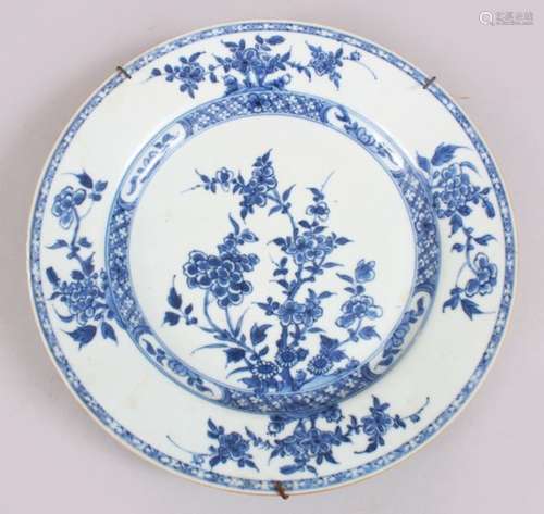 A GOOD 18TH CENTURY CHINESE BLUE & WHITE PORCELAIN PLATE, decorated with floral scenes, mounted with