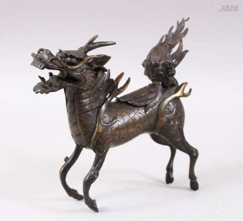 A GOOD CHINESE MING DYNASTY STYLE BRONZE QILIN INSENCE BURNER, stood in a striding pose with its