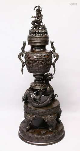 A LARGE AND IMPOSING JAPANESE BRONZE SECTIONAL DRAGON KORO, this large koro in sectional pieces, the