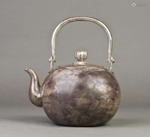 A ROUNDED JAPANESE SILVER TEAPOT