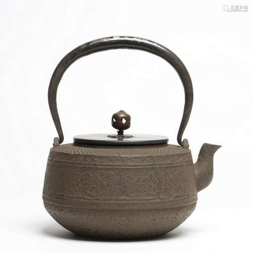 A JAPANESE TETSUBIN CAST IRON TEAPOT