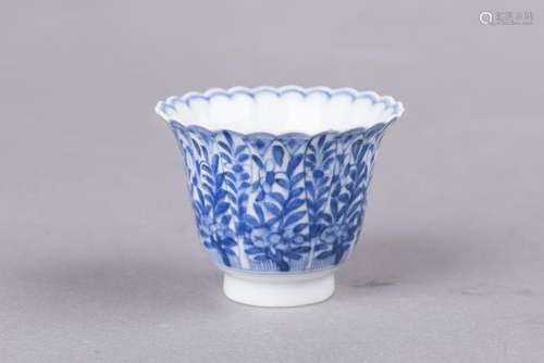 A BLUE AND WHITE CUP