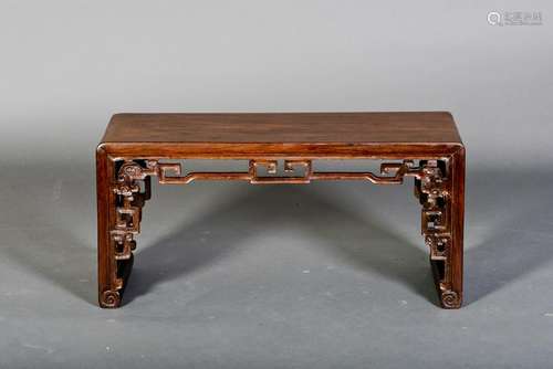 A HUANGHUALI SHORT KANG TABLE, QING DYNASTY