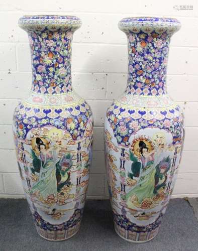 A LARGE PAIR OF 20TH CENTURY CHINESE FAMILLE ROSE FLOOR STANDING VASES, depicting scenes of