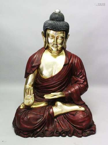 A LARGE PAINTED AND GILDED MODEL OF A SEATED BUDDHA, approx. 165cm high x 80cm wide x 75cm deep.