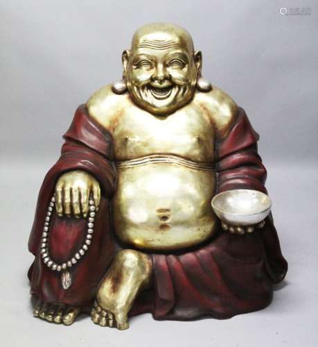 A LARGE PAINTED AND GILDED MODEL OF A SEATED BUDDHA, approx. 95cm high x 90cm wide x 65cm diameter.