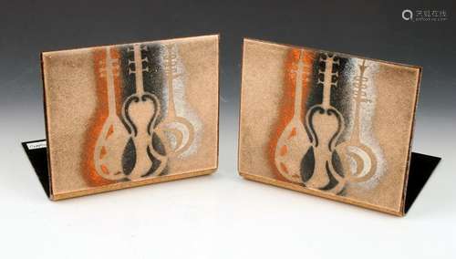 PAIR OF MCM COPPER ENAMELED MUSIC BOOKENDS