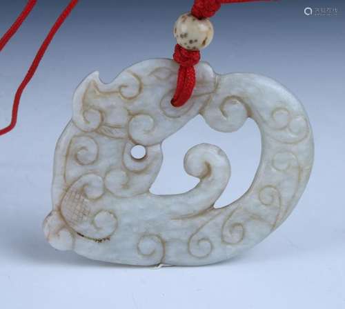 JADE CARVED AND PIERCED DRAGON PENDANT