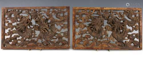 PAIR OF CARVED WOODEN DRAGON PANELS