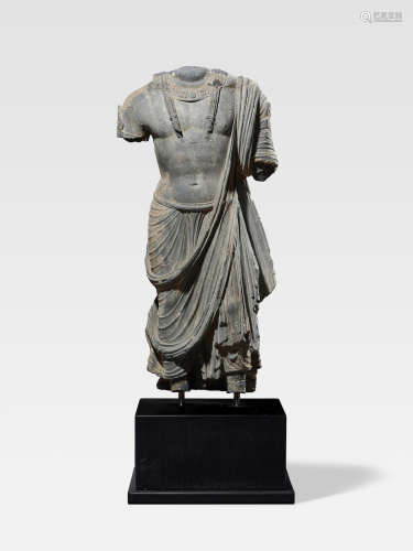 A SCHIST TORSO OF A BODHISATTVA  ANCIENT REGION OF GANDHARA, 3RD/4TH CENTURY