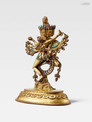 A GILT COPPER ALLOY FIGURE OF HEVAJRA   TIBET, 15TH/16TH CENTURY