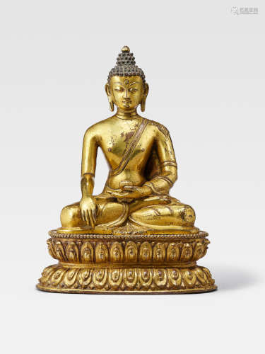 A GILT COPPER ALLOY FIGURE OF SHAKYAMUNI  NEPAL, DATED 1796/1797