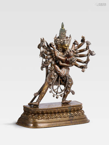 A SILVER INLAID BRASS AND COPPER ALLOY FIGURE OF CHAKRASAMVARA  QIANLONG PERIOD (1735-1796)