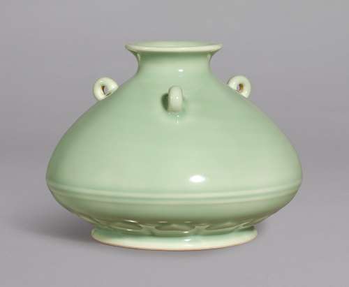 A FINE AND RARE MOULDED CELADON-GLAZED HANDLED FLOWER VESSEL SEAL MARK AND PERIOD OF YONGZHENG