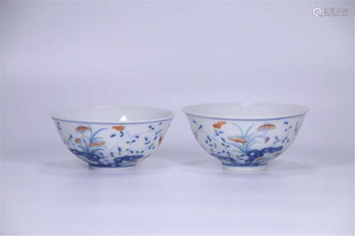 PAIR OF CHINESE PORCELAIN BLUE AND WHITE WUCAI ORCHID AND ROCK CUPS