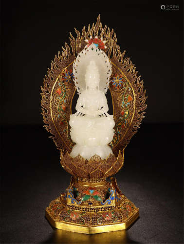 CHINESE WHITE JADE SEATED GUANYIN ON GILT SILVER ENAMEL NICHE