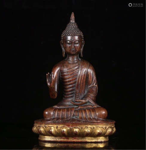 CHINESE AGALWOOD SEATED BUDDHA ON GOLD PAINTED BASE