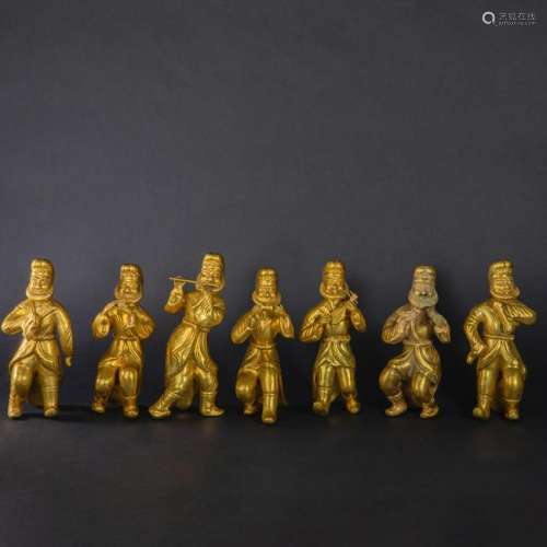 SEVEN CHINESE GILT SILVER MUSICAN FIGURES