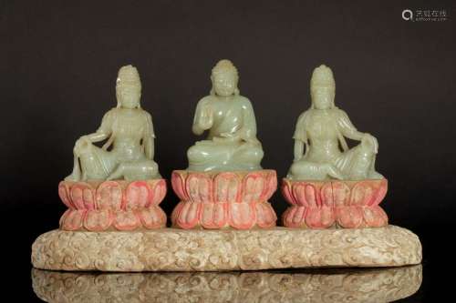 THREE CHINESE CELADON JADE SEATED BUDDHA