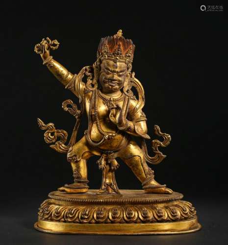 TIBETAN GILT BRONZE STANDING BUDDHIST GUARDIAN