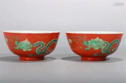 PAIR OF CHINESE PORCELAIN RED GROUND GREEN DRAGON BOWLS